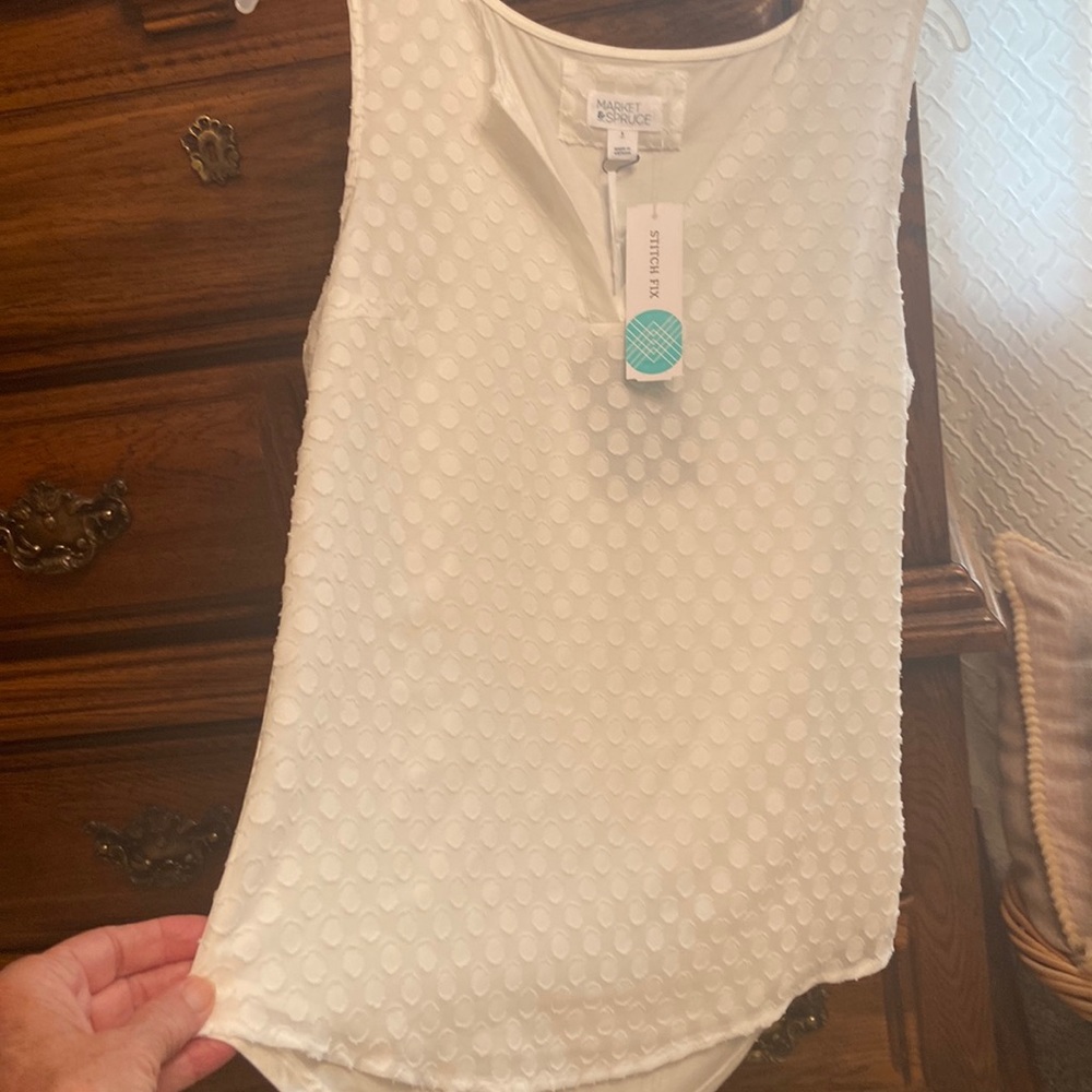 COPY - Sleeveless top. White brand new with tags . Size small